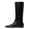 Botas de estilo minimalista de cuero suave con punta cuadrada, nuevo modelo invierno 2026, versátiles slip-on de suela plana, estilizan y son elegantes, de media pantorrilla.