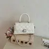 Bolsa transversal pequena quadrada de alta qualidade feminina 2026 novo estilo chique francês com padrão de losango e corrente bolsa de ombro único transversal versátil da moda