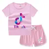 Conjunto de Camiseta de Manga Corta Redonda y Shorts de Verano para Niños 2026 Estilo Coreano Casual Absorbente de Sudor Color Caramelo Sudadera para Bebé