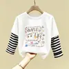 Nova Camiseta de Algodão Puro Patchwork com Gola Redonda e Manga Longa para Crianças, Estilo Fino, Primavera e Outono 2026, Meninas, Desenho Animado, Top Versátil