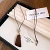 Collar de cordón de cuero con perla cuadrada de acrílico, estilo vintage y artístico, cadena para suéter, diseño único, joyería de lujo ligera, venta al por mayor
