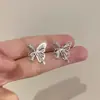 Pendientes de plata 925 con forma de mariposa y circonita hueca, estilo francés, con temperamento de hada súper elegante y delicado estilo de hada.
