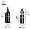 En stock venta al por mayor 5ml-100ml botella negra para aceites esenciales botella de vidrio con gotero botella de esencia botella de vidrio para subempaque de cosméticos