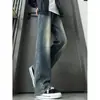Calça jeans preta masculina de corte enviesado, perna reta, modelagem solta, estilo high-street americano, moderna, estilosa, versátil, modeladora, calça longa levemente boca de sino