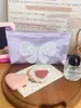 Bolsa de Maquiagem com Laço Perolado Roxo Transfronteiriça Estilo Ins Fresco Coração de Menina Grande Capacidade Bordado Bolsa de Armazenamento de Nicho