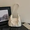 Bolsa tote estilo francês, de nicho, retrô e chique para mulheres, nova coleção 2026, moderna, simples, bolsa de ombro versátil, mochila fashion