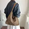 Bolso de lona tipo tote casual con estampado de leopardo estilo coreano para mujer, nuevo modelo otoño 2026, bolso de hombro de gran capacidad con estampado de estrellas