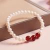Pulsera de perlas naturales de agua dulce, temperamento de moda simple, diseño de nicho femenino, ágata roja, novias, joyería de perlas al por mayor