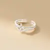 Anillo de Plata de Ley S925 Estilo Coreano Flor de Cuatro Hojas Fila de Diamantes Doble Capa Hueco Joyería de Mano Simple Flor R00542
