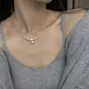 Collar de perlas de azúcar con temperamento retro francés, cadena para suéter de moda Joker de alto sentido, joyería simple de nicho al por mayor