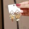 Pendientes de borla con hojas multicapa de diamantes huecos con temperamento de moda europea y americana para mujer, pendientes delgados exagerados con aguja de plata s925 para mujer