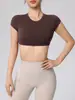 Camiseta Deportiva de Manga Corta Wangtu Ombliguera para Yoga con Almohadilla en el Pecho Fitness Running Deportes Fábrica de Comercio Exterior Se puede imprimir