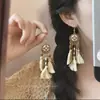 Pendientes de Flor Tejida Estilo Resort Vacacional Romano para Mujer, Clips para Orejas, Pendientes Elegantes de Gama Alta, Clavos Exagerados de Playa