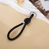 Encanto de Celular Colorido da Moda com Nó Romano Trançado em Cordão de Couro Pingente de Chaveiro Versátil Simples Corrente para Pendurar com Contas de Prata