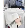 Suéter de cuello alto cruzado al por mayor para hombre, nuevo estilo otoño e invierno 2026, camiseta básica de punto versátil de color liso para hombres de mediana edad