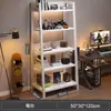 Estante de armazenamento de chão, estante de livros multicamadas, armário de armazenamento ao lado da mesa do computador em sala de jogos, prateleira de exibição em forma de escada de arte em ferro