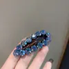 Pinza de Clip Ovalada con Pedrería Estilo Coreano para Mujer 2026 Modelo Nuevo Lujo Ligero Versátil para el Uso Diario Pinza Lateral para Fijar Cabello Suelto Pasador Accesorio para el Cabello