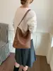 Bolso tipo cubo casual de alta gama transfronterizo de verano 20266, gran capacidad, estilo relajado, bolso de hombro y debajo del brazo de nicho para el día a día