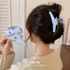 Grampo de cabelo de alta qualidade, azul leitoso fresco com listras, laço, pequeno nicho, alta qualidade, tamanho médio, presilha de tubarão