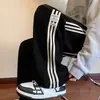 Pantalones de chándal Estilo Nuevo Otoño/Invierno 2024 para Hombre Tendencia Europea Algodón Terciopelo Pantalones Casuales para Hombre Rectos Largos Pantalones Pesados de Tres Rayas