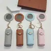 Regalo Popular Práctico Transfronterizo: Estuche Redondo para Labial Estilo Piel con Colgante de Espejo de Maquillaje de Alta Definición Impreso a Color, Portátil y Conveniente