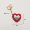 Espejo de Maquillaje Portátil con Forma de Corazón de Cuero Llavero Espejo Mini Colgante para Bolso Multicolor Venta al por Mayor de Fábrica en Stock