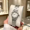 Nuevo Frost Dorado Real Mini Esfera Mate Movimiento de Cuarzo para Mujer Serie Roble Correa de Acero Reloj para Mujer Venta al por Mayor