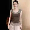 Top de encaje estilo retro francés con cuello redondo sin mangas 2026 Verano Nuevo Chica Caliente Versátil Hermoso Top de punto