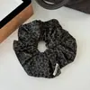 Moda Otoño e Invierno Nuevo Scrunchie de Cuero con Estampado de Leopardo Nicho de Gama Alta Retro Accesorio para Cola de Caballo