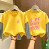 Camiseta de manga longa 100% algodão para meninas, nova para primavera e outono, camisa de base infantil, tamanho médio e grande, blusa infantil de duas peças falsas com desenho
