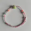 Pulsera de Hilo Colorida Tejida a Mano para el Día del Niño, con Elementos de Arcilla Daruma y Marrones, una Pulsera de Seguridad para Niños, Adecuada como Regalo Turístico