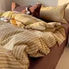 Ins juego de cuatro piezas de algodón lavado a rayas todo algodón borde de concha de clase A funda nórdica de algodón puro juego de tres piezas de ropa de cama Nantong 4