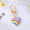 Chaveiro de personalidade simples Diamante Amor arco-íris cor de liga gota de óleo coração de pêssego cílios bolsa de olho pingente