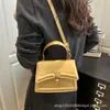 Bolso de Mujer Moderno y Sencillo Modelo Nuevo 2026 Bolso de Hombro con Hebilla de Cerradura, Bolso Cruzado Único de Nicho