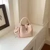 Bolso de Mano de Oficina Transfronterizo de Moda para Mujer, Nuevo Estilo 2026, Bolso Cubo de Hombro Cruzado de Moda para Verano