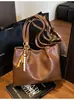 Bolso de nicho de moda para mujer, nuevo modelo 2026, casual versátil con sensación de alta gama, bolso versátil de hombro y cruzado, moderno