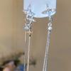 Lujo Ligero, Gama Alta, Pedrería Súper Brillante, Aretes de Borla Asimétricos de Estrella de Cuatro Puntas para Mujer, Nuevos Aretes de Moda