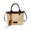 Bolso cuadrado pequeño único, elegante, casual, simple y retro, nuevo bolso de hombro y bandolera de moda para mujer Otoño 2026