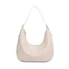 Nueva bolsa tejida de moda europea y americana para ir al trabajo con diseño de gran capacidad, bolso de hombro tipo dumpling minimalista urbano, bolso de axila tipo media luna