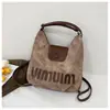 Bolsa de Ombro Casual Grande Capacidade Estilo Ocidental Simples Nicho Bolsa Tote Nova para o Outono 2025