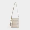 Bolso tejido a mano nuevo de nicho con diseño calado y sensación de alta gama, bolso de paja estilo vacacional, bolso de playa, bolso bandolera tipo cubo