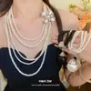 Colar multicamadas vintage europeu e americano com pérolas, diamantes, estrelas e flores, corrente de clavícula da moda para o dia a dia, acessório feminino versátil