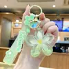 Chaveiro Copo de Chá com Leite Iceberg Colorido Transfronteiriço Pingente de Bolsa para Casal Anel de Chaveiro Exquisito com Areia Movediça Líquida