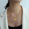Europeo y Americano Marka tendencia viento caliente chica engranaje colgante letra borla collar acero de titanio chapado en oro de 18K joyería al por mayor