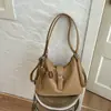 Mochila feminina popular transfronteiriça simples e estilosa de grande capacidade 2026 nova bolsa versátil casual para trabalho e ombro e transversal