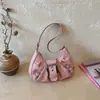 Nuevo estilo retro americano de viajero, bolsa de mano grande de pliegues para el verano 2026, bolso de hombro simple para mujer