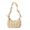 Bolsa Feminina de Ombro Único/Axila Design de Nicho Francês Popular Transfronteiriça 2025 Nova Bolsa Meia-Lua Plissada Bolsa de Textura para o Dia a Dia