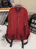 Mochila de viaje versátil estilo coreano para parejas con bordado de letras, mochila escolar elegante y duradera para chicos de secundaria y preparatoria