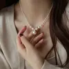 Collar de perlas degradadas grande y pequeño, cadena para la clavícula de lujo ligero de nicho para mujer 2026, accesorio de cadena para suéter, cadena de sonrisa
