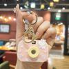 Nuevo llavero de cámara de proyección de cristal de dibujos animados Sanrio, creativo, exquisito colgante para bolso de niña, juguete lindo